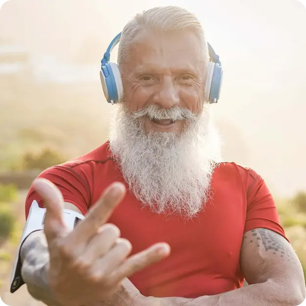 An older man posing in the sun.