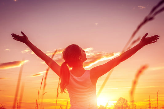 Woman with hands up who avoids gluten