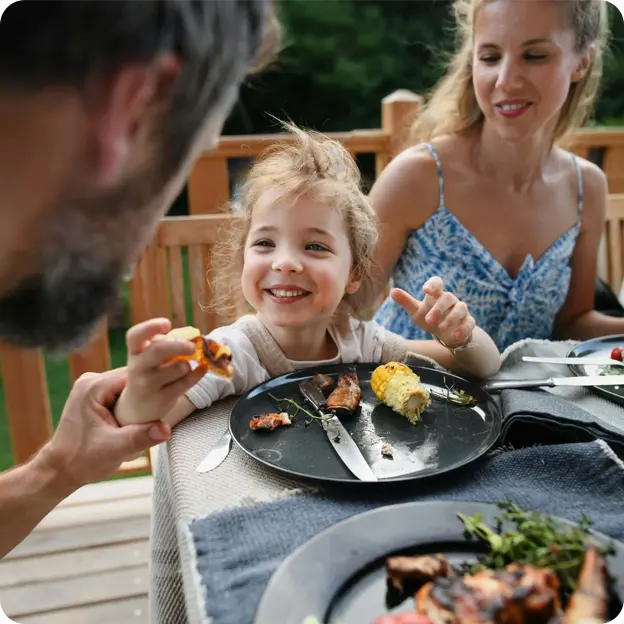 A family enjoying a meal together.
