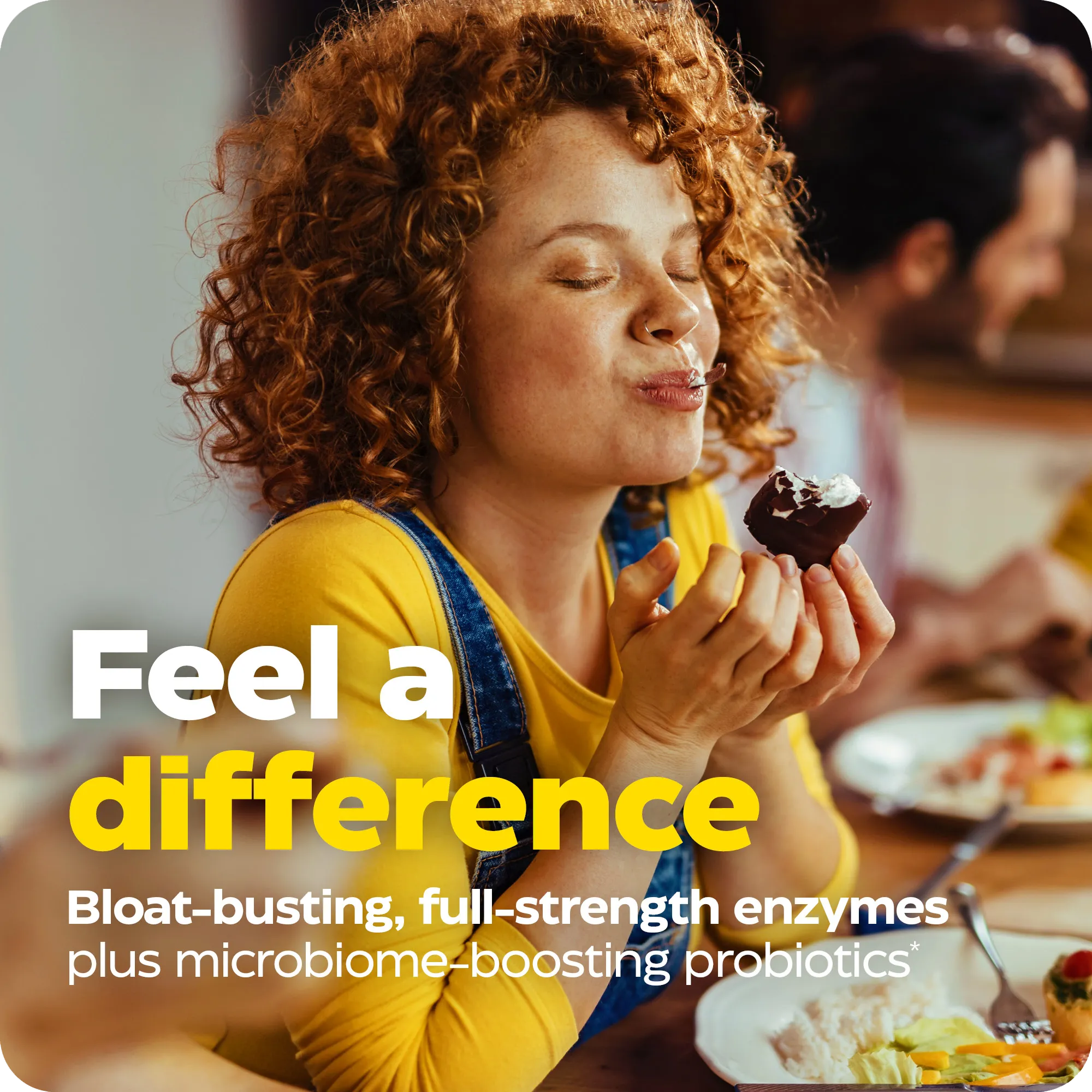Woman enjoying a bite of dessert with overlaid text promoting bloat-busting full-strength enzymes plus microbiome-boosting probiotics.