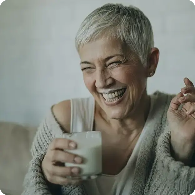 Woman drinking milk.