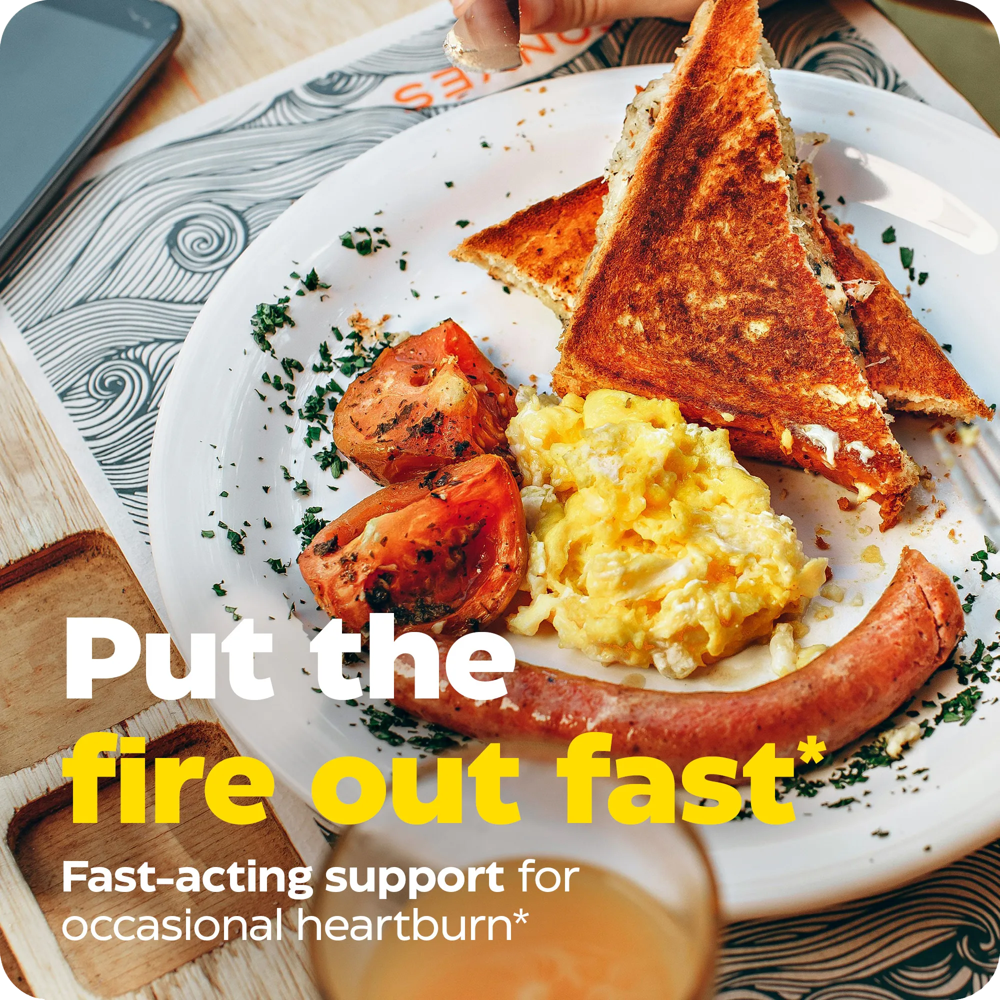 Breakfast plate with toast, eggs, sausage, and tomatoes overlaid with text: Put the fire out fast, fast-acting support for occasional heartburn.
