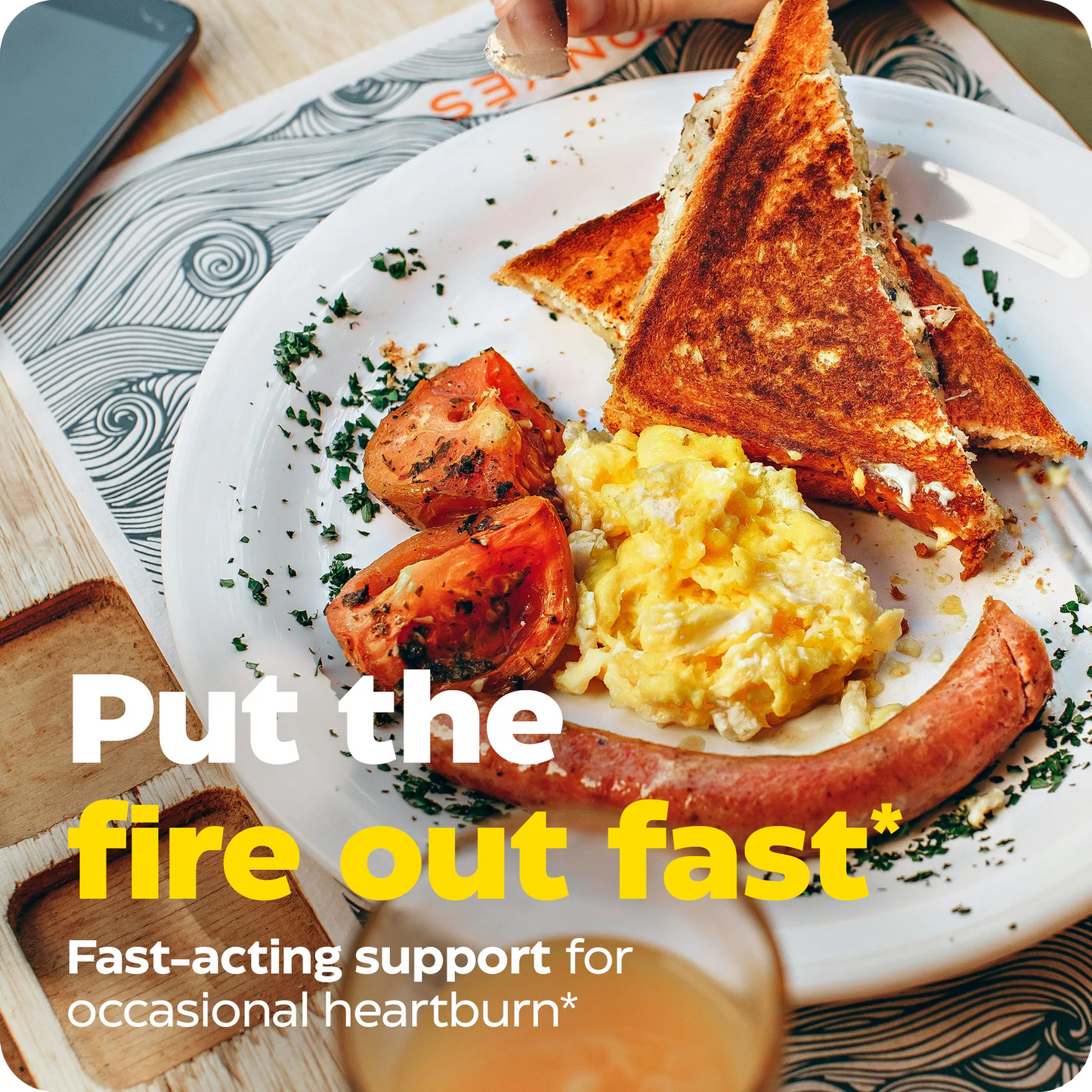 Breakfast plate with toast, eggs, sausage, and tomatoes overlaid with text: Put the fire out fast, fast-acting support for occasional heartburn.