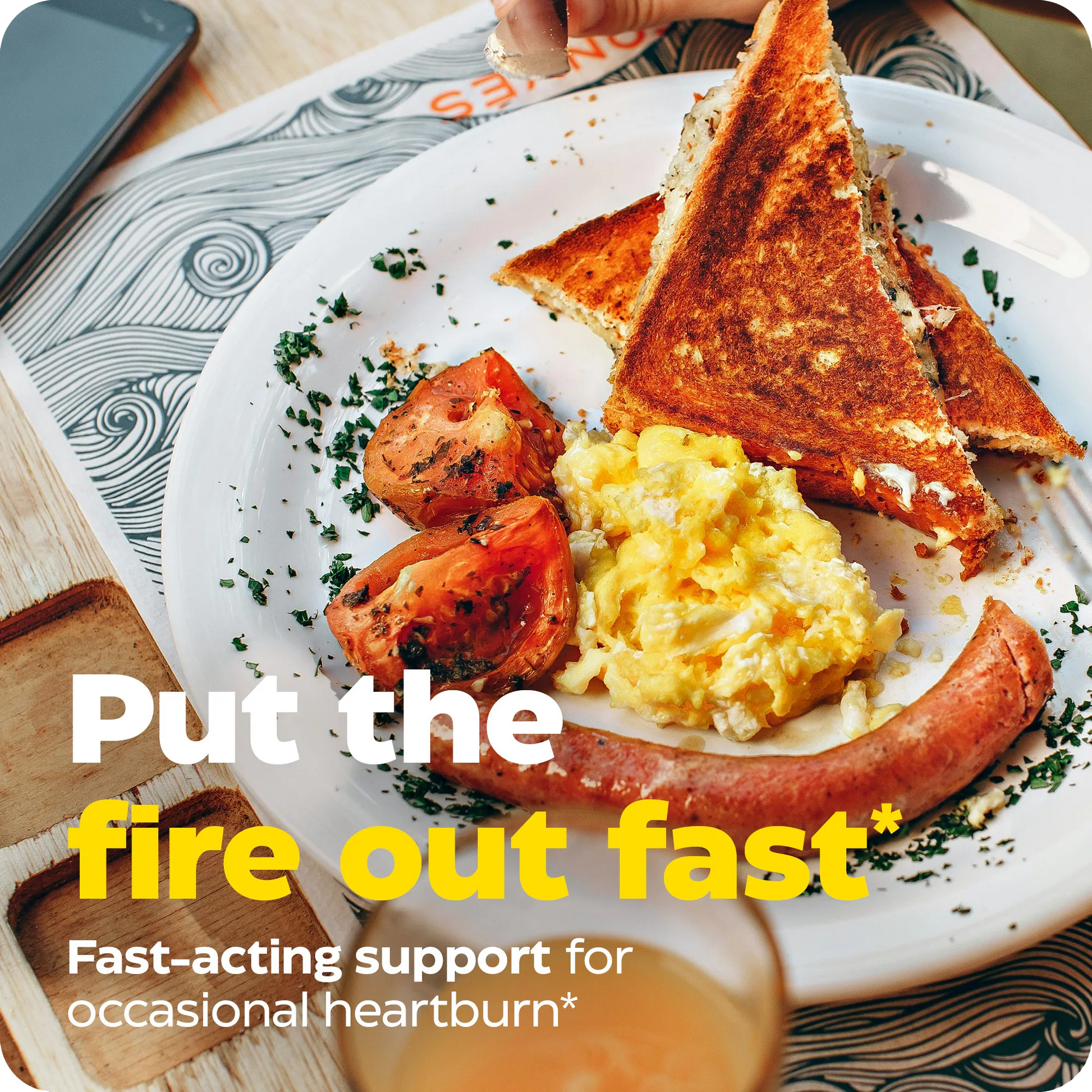 Breakfast plate with toast, eggs, sausage, and tomatoes overlaid with text: Put the fire out fast, fast-acting support for occasional heartburn.