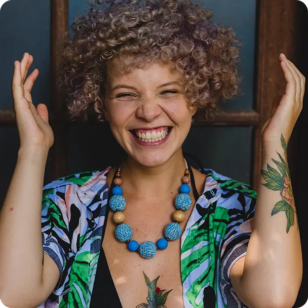 This image shows a woman smiling.