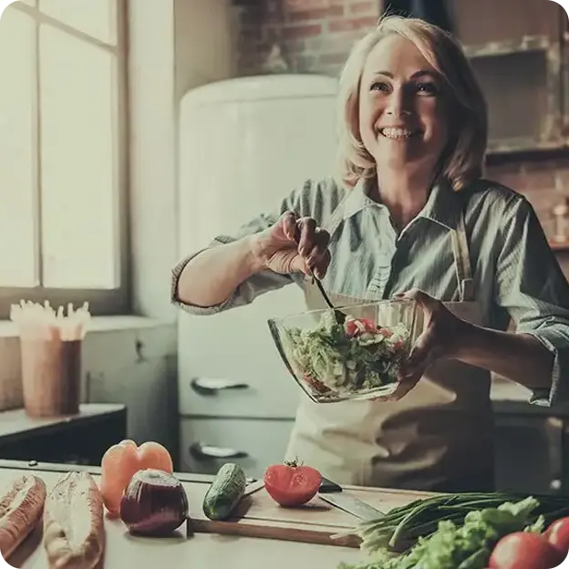 Woman making a salad.